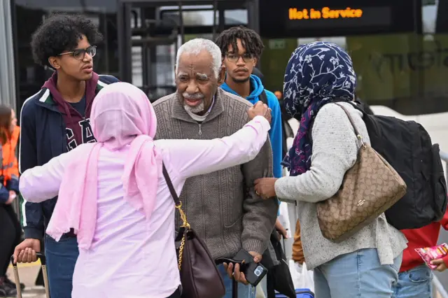 People arriving from Sudan at Stansted Airport