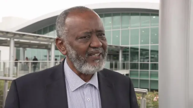 A man at Larnaca airport in Cyprus who was evacuated from Sudan