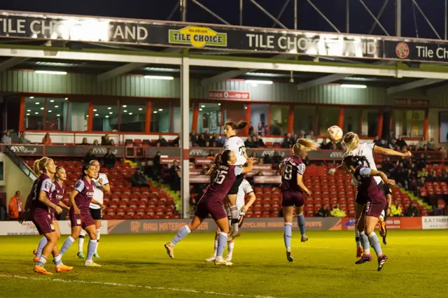 Millie Turner heads in the winning goal.