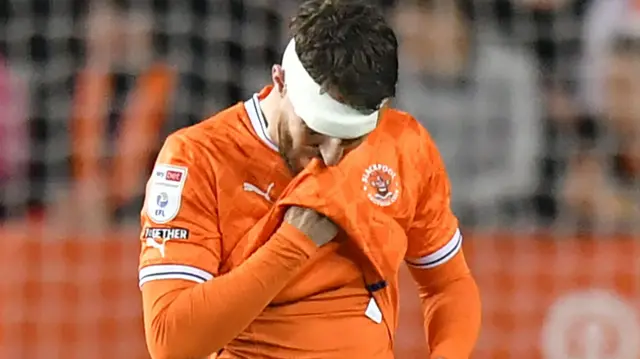 Blackpool's James Husband looks dejected after relegation