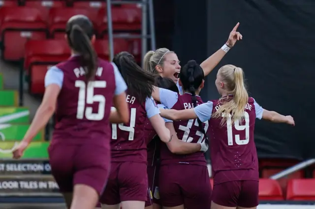 Aston Villa make the most of their few chances, Daly celebrates scoring.