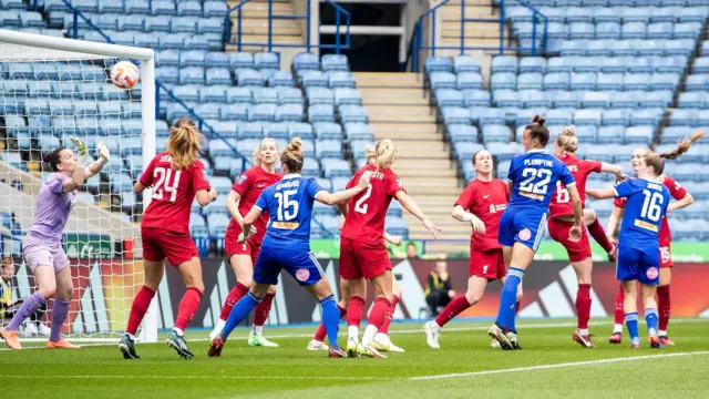 Ashleigh Plumptre scores with a header