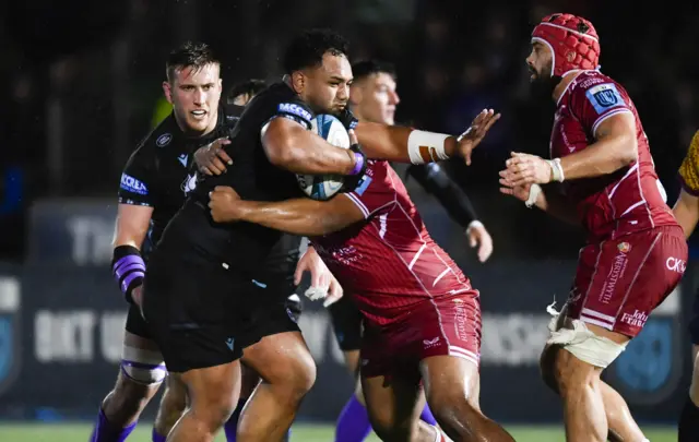 Glasgow's Sione Vailanu carries the ball against Scarlets