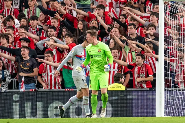 Ter Stegen celebrates making a save v Athletic club.