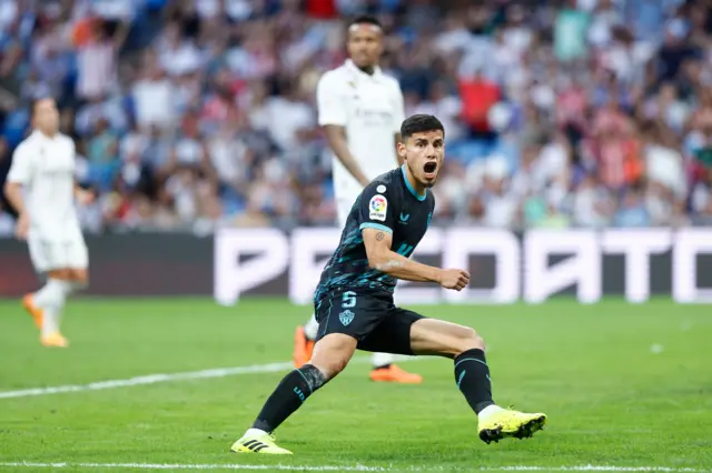 Robertone celebrates scoring Almeria's second goal of the game.