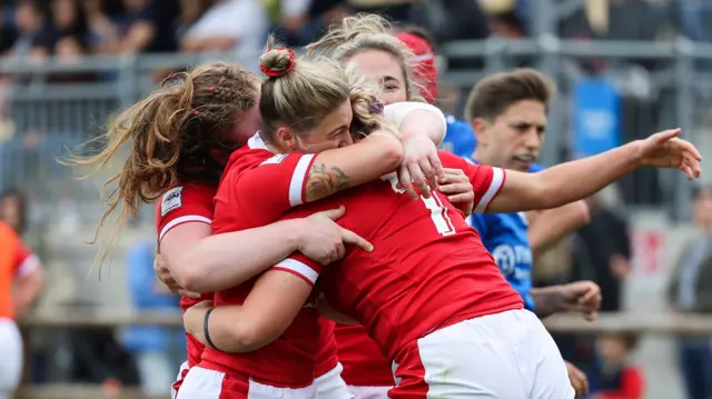 Wales celebrate victory in Italy