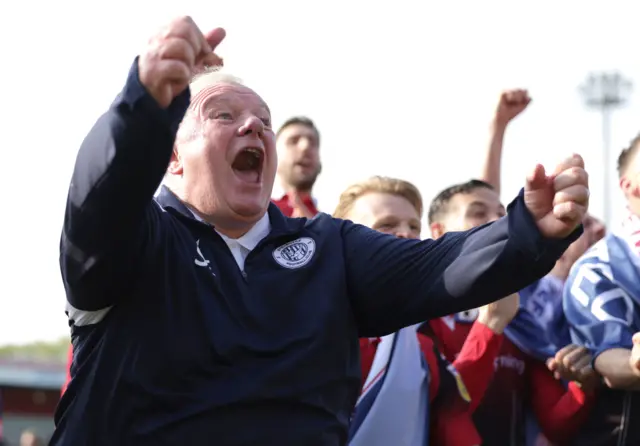 Stevenage boss Steve Evans celebrates promotion