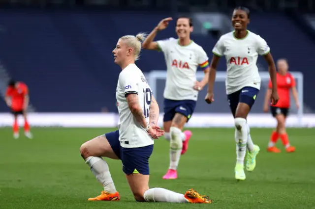 Beth England celebrates