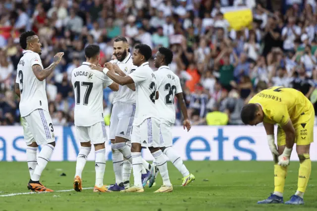 Real Madrid celebrate scoring v Almeria.