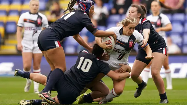 Shona Hoyle pushes through the France defence