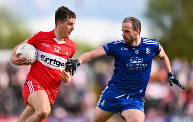 Shane McGuigan of Derry in action against Conor Boyle of Monaghan