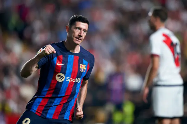 Robert Lewandowski celebrates scoring v Rayo Vallecano.