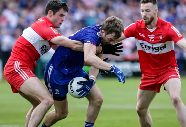 Derry's Chrissy McKaigue and Niall Loughlin bottle up Monaghan's Jack McCarron in last year's Ulster semi-final