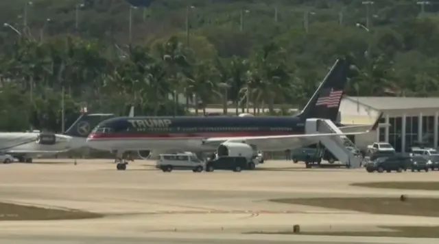 A group boards Trump's personal plane