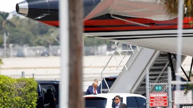 Trump boarding plane