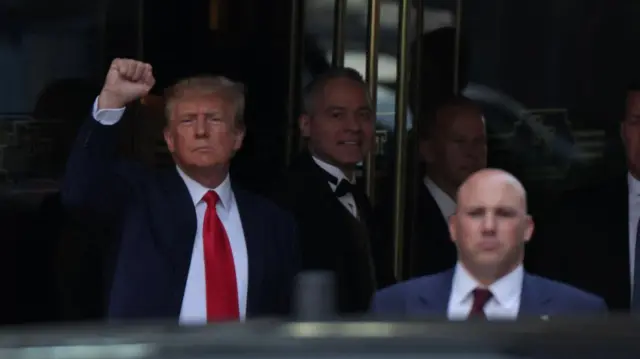 Former U.S. President Donald Trump departs from Trump Tower on the day of Trump's planned court appearance