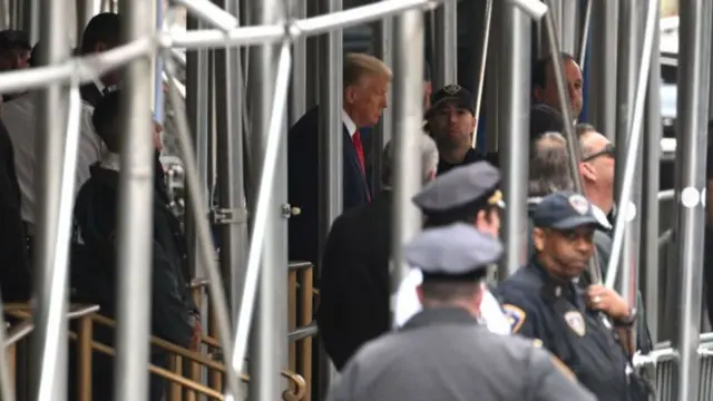 Donald Trump leaves court