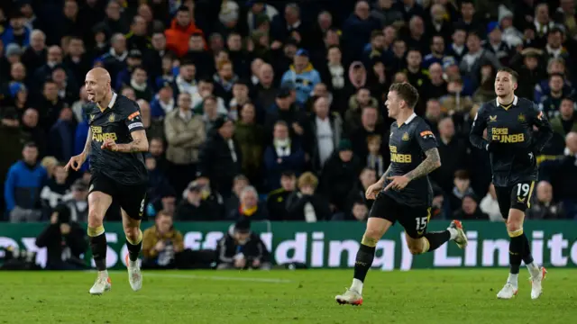 Jonjo Shelvey (left) celebrates scoring at Leeds last season for Newcastle