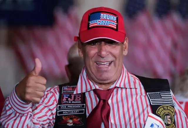 A Trump supporter in the Mar-a-Lago ballroom