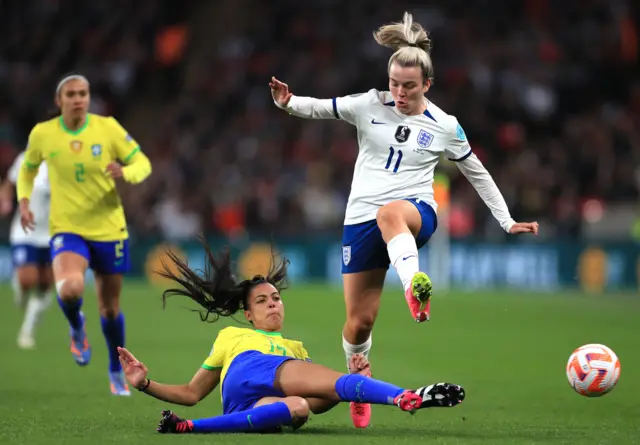 England's Lauren Hemp marauds down the wing.