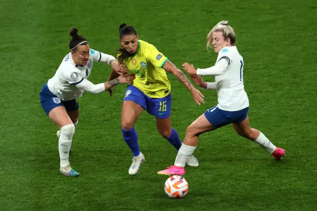 England crowd out a Brazil attack.