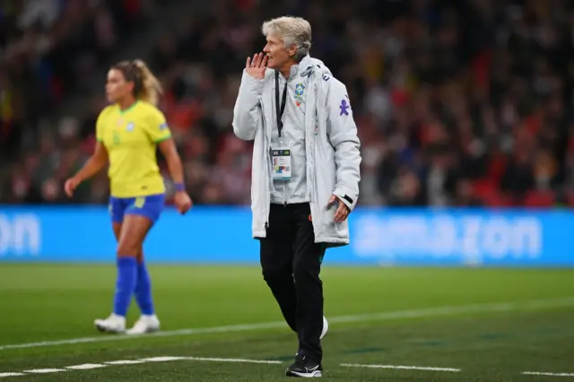 Brazil coach Pia Sundhage shouts instructions to her team.