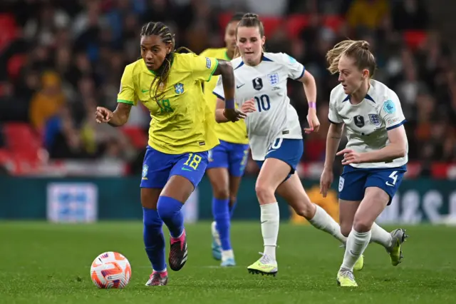 Brazil forward Geyse drives into the final third.