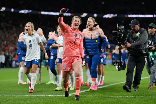 England celebrate their win over Brazil.