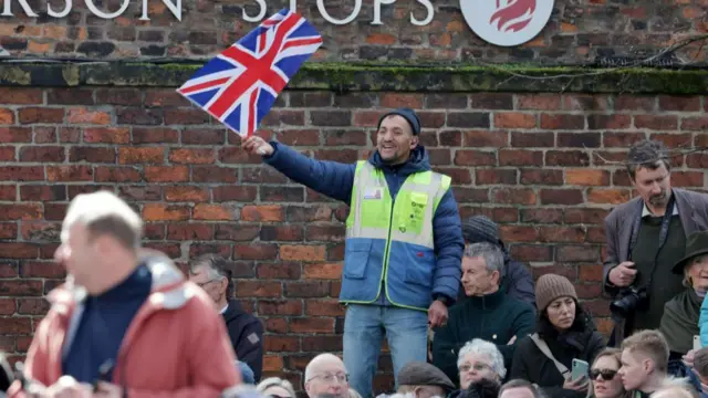 A person waving a flag