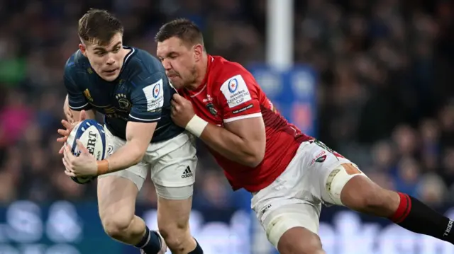 Leicester tackle a Leinster player