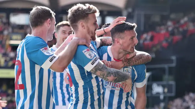 Huddersfield celebrate taking the lead at Watford