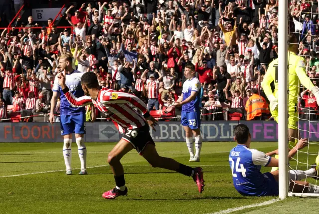 Iliman Ndiaye celebrates scoring for Sheffield United against Wigan