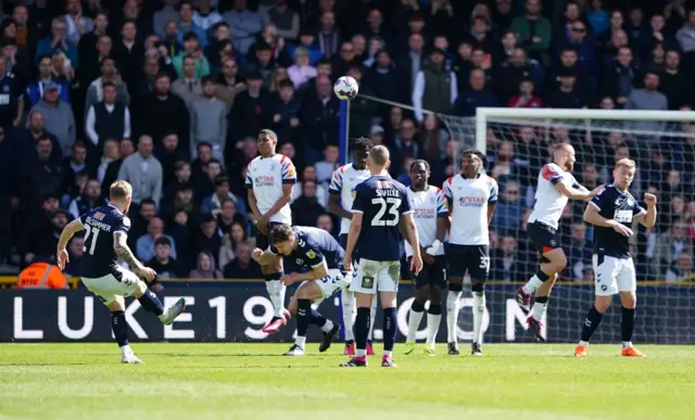 Andreas Volglsammer takes a free-kick for Millwall