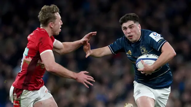 Leinster's Jimmy O'Brien holds off a Leicester opponent