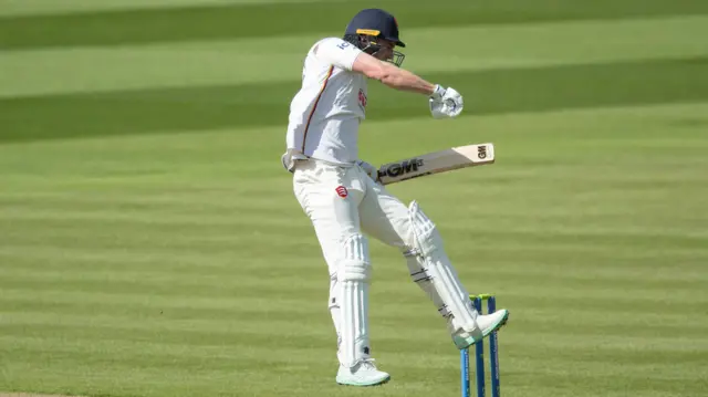 Dan Lawrence of Essex celebrates his century against Middlesex