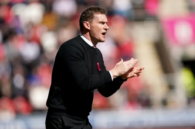 Rotherham boss Matt Taylor applauds his side