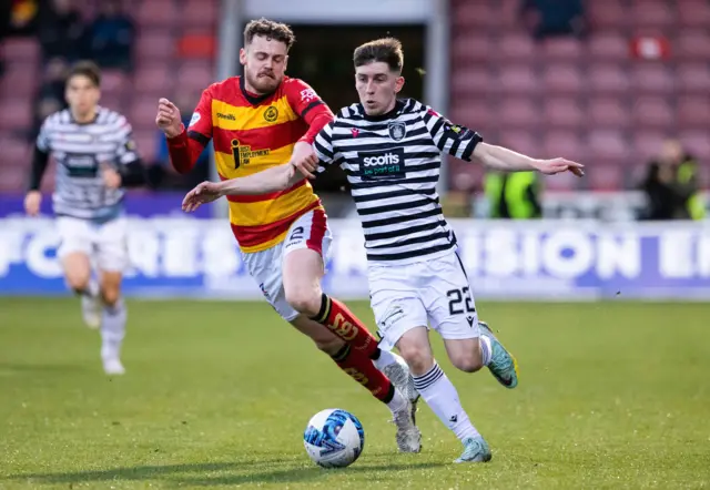 Queen's Park's Aaron Healy and Partick Thistle's Jack McMillan in action