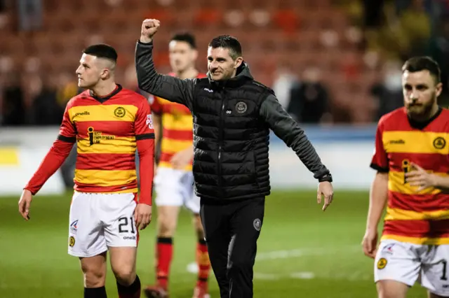 Kris Doolan celebrates