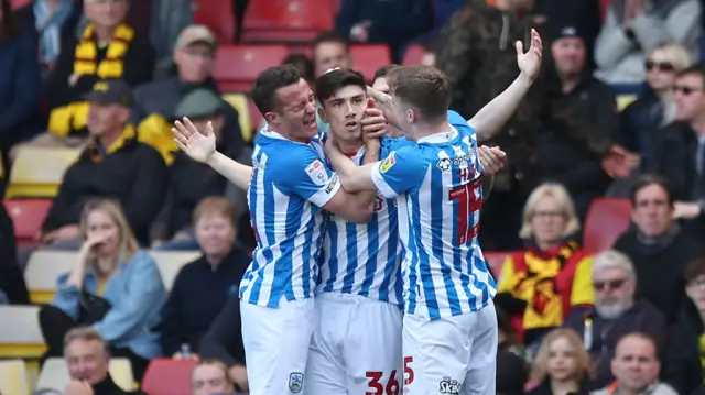 Huddersfield celebrate Kian Harratt's goal at Watford