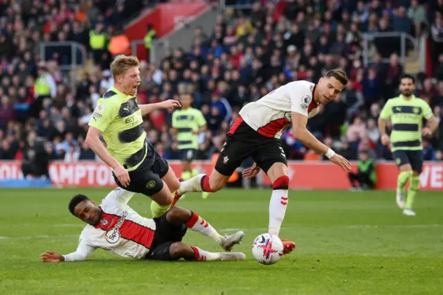 Kevin De Bruyne of Manchester City is fouled by Kyle Walker-Peters of Southampton