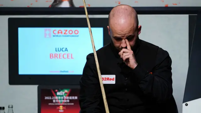 Luca Brecel sits in his chair