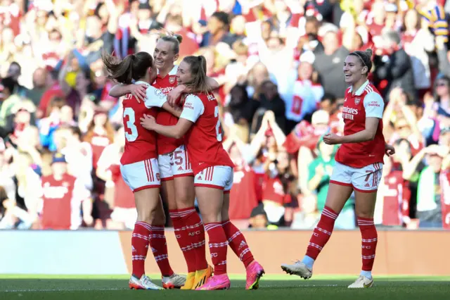 Arsenal celebrate scoring the opening goal.