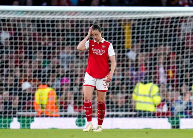 Wubben Moy holds her head after conceding the equaliser.