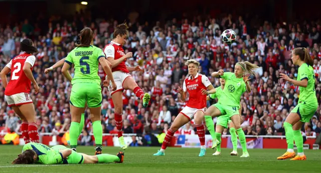 Jen Beattie heads in the equaliser for Arsenal.