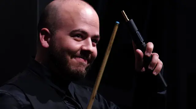 Luca Brecel waves to the crowd