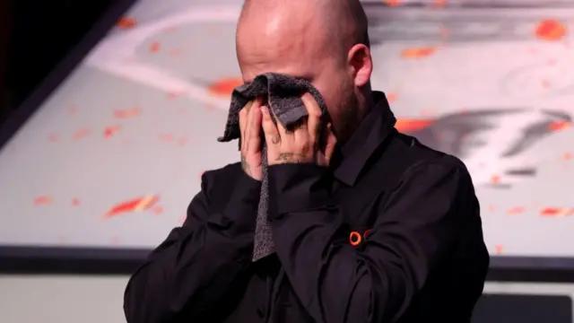 Luca Brecel in tears after winning the world title