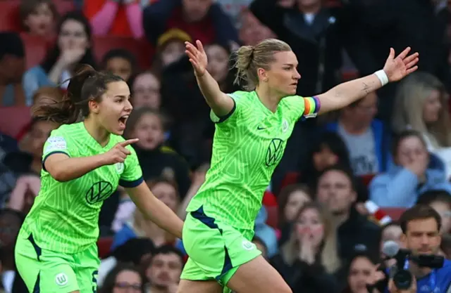 Alex Popp celebrates her goal v Arsenal.