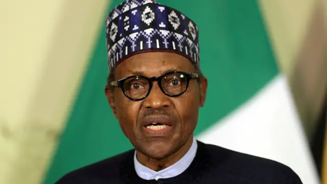 Nigerian President Muhammadu Buhari speaks at a news conference during a visiit to Pretoria, South Africa, October 3, 2019.