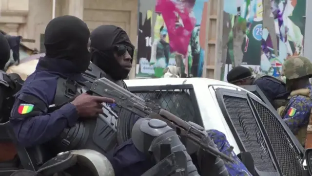 Riot police in Conakry, Guinea - 10 May 2023 (Screengrab)