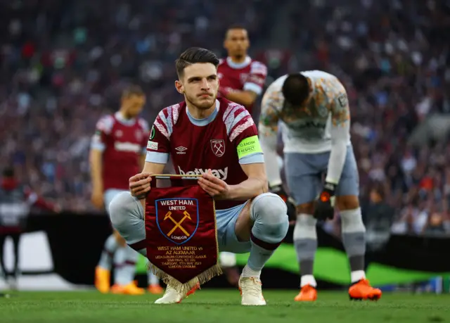 Declan Rice waits for the team photo.